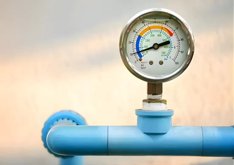 Close-up of a water pressure gauge indicating low water flow in a home, Springdale Plumbing solutions
