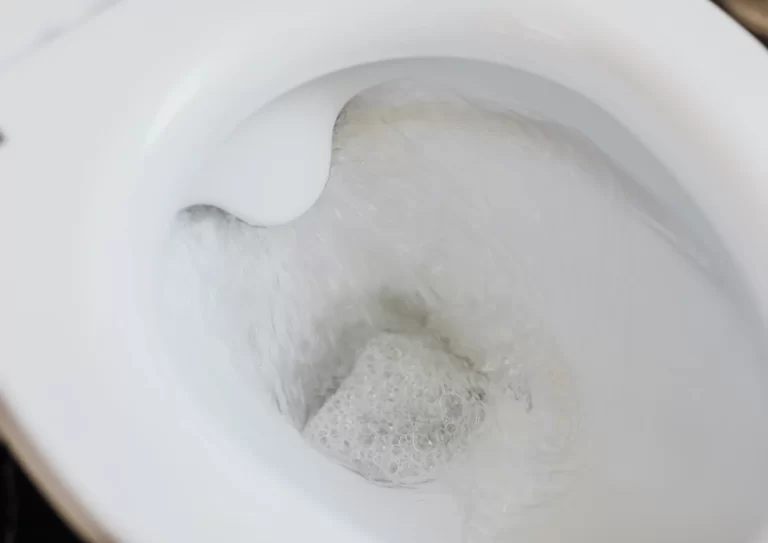 Close-up of a toilet running nonstop after flushing, expert plumbing repair by Springdale Plumbing